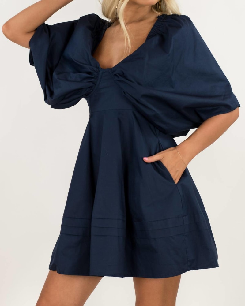 Front of a model wearing a size LARGE Poppy Mini Dress In Navy in Navy by En Saison. | dia_product_style_image_id:342180